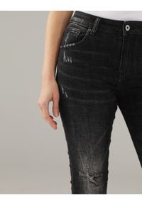 Unisono - JEANSY Z PRZETARCIAMI. Materiał: jeans. Długość: długie. Styl: klasyczny