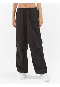 Tommy Jeans Spodnie materiałowe DW0DW16387 Czarny Relaxed Fit. Kolor: czarny. Materiał: syntetyk, bawełna