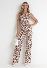 Born2be - Beżowy Kombinezon Lasthotis. Kolor: beżowy. Długość rękawa: bez rękawów. Długość: długie. Wzór: kolorowy, geometria. Sezon: lato #2