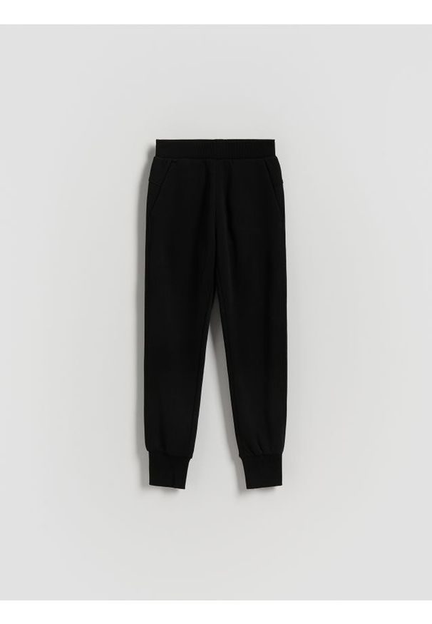 Reserved - Spodnie dresowe - czarny. Kolor: czarny. Materiał: dresówka