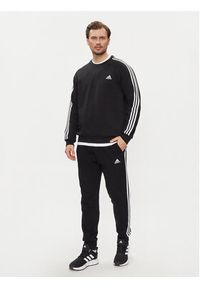 Adidas - adidas Spodnie dresowe Essentials French Terry Tapered Cuff 3-Stripes Joggers HA4337 Czarny Regular Fit. Kolor: czarny. Materiał: bawełna