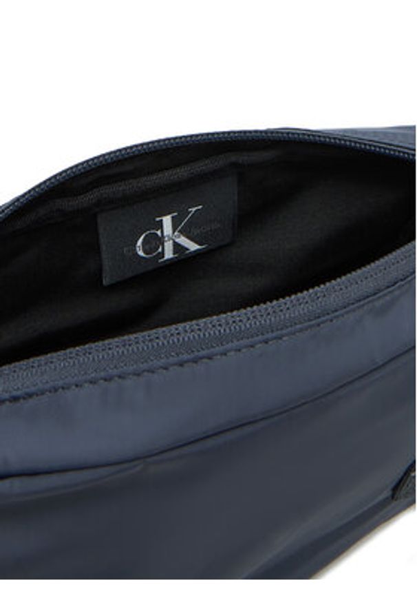 Calvin Klein Jeans Saszetka Sport Essentials Ut Flap Cb22 LV04G3031G Granatowy. Kolor: niebieski. Materiał: materiał