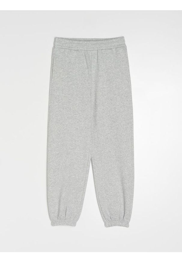 Sinsay - Spodnie dresowe z elastyczną gumą w pasie - szary. Kolor: szary. Materiał: dresówka, guma
