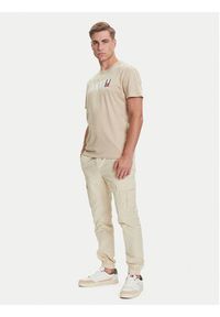 Tommy Jeans Joggery Austin DM0DM21791 Beżowy Slim Fit. Kolor: beżowy. Materiał: bawełna #3