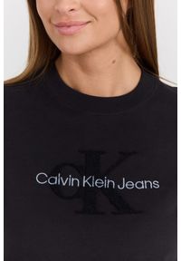 Calvin Klein - CALVIN KLEIN Czarny damski t-shirt z haftowanym logo. Kolor: czarny. Materiał: bawełna. Długość rękawa: krótki rękaw. Długość: krótkie. Wzór: haft. Styl: elegancki #3