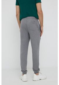 Lacoste Spodnie bawełniane męskie kolor szary z aplikacją. Kolor: szary. Materiał: bawełna. Wzór: aplikacja