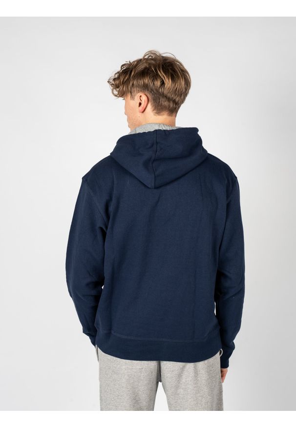 Champion Bluza "Hoodie" | HBGF89H586N9A | Mężczyzna | Granatowy. Okazja: na co dzień. Typ kołnierza: kaptur. Kolor: niebieski. Materiał: bawełna, poliester. Wzór: aplikacja. Styl: casual