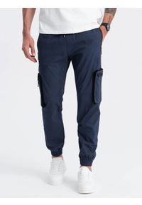 Ombre Clothing - Męskie spodnie JOGGERY z zapinanymi kieszeniami cargo - granatowe V5 - Rozmiar: S. Kolor: niebieski. Materiał: guma, tkanina, elastan, bawełna. Wzór: nadruk