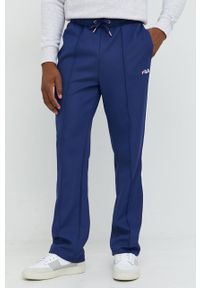Fila spodnie dresowe męskie kolor granatowy z aplikacją. Kolor: niebieski. Materiał: dresówka. Wzór: aplikacja #3