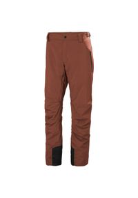 Spodnie narciarskie Helly Hansen Legendary. Kolor: pomarańczowy. Sezon: zima. Sport: narciarstwo #1