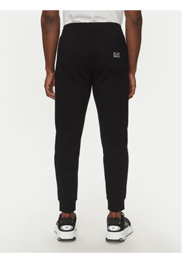 EA7 Emporio Armani Spodnie dresowe 7M000572 AF10377 MC001 Czarny Regular Fit. Kolor: czarny. Materiał: bawełna