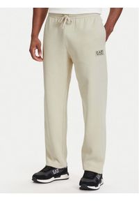 EA7 Emporio Armani Spodnie dresowe 7M002235 AF21822 U1079 Beżowy jasny Regular Fit. Kolor: beżowy. Materiał: bawełna #1