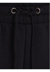 Under Armour Spodnie dresowe Essential Fleece Joggers 1373034 Czarny Regular Fit. Kolor: czarny. Materiał: dresówka, bawełna