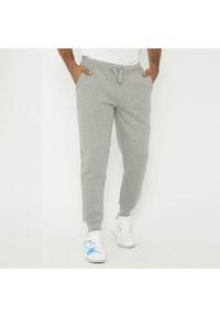 LEGEA - Wygodne spodnie sportowe SOFIA oversize szare. Kolor: szary. Sport: fitness #1