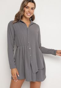 Born2be - Szara Asymetryczna Sukienka o Koszulowym Kroju z Gumką w Talii Elodina. Kolor: szary. Długość rękawa: długi rękaw. Typ sukienki: koszulowe, asymetryczne. Styl: elegancki, sportowy #1