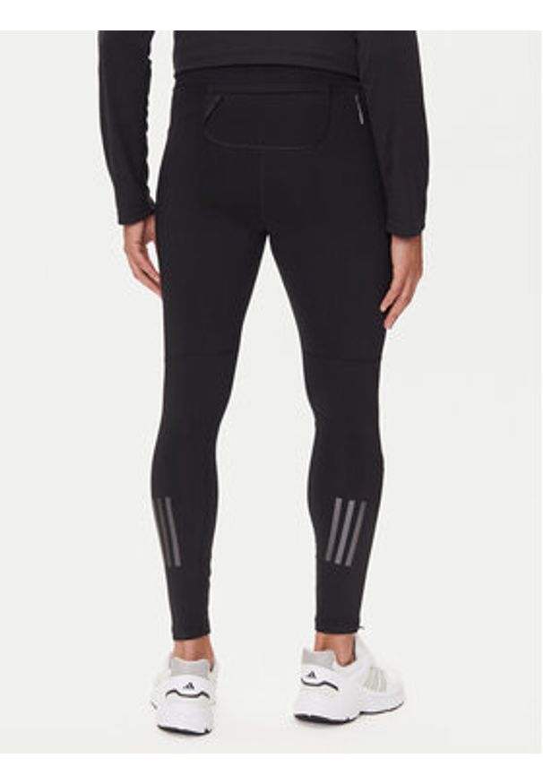 Adidas - adidas Legginsy Own The Run Winterized JN9597 Czarny Slim Fit. Kolor: czarny. Materiał: syntetyk. Sport: bieganie