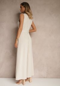 Renee - Jasnobeżowy Kombinezon o Taliowanym Kroju z Wiskozą i Paskiem Raliorea. Kolor: beżowy. Materiał: wiskoza. Styl: elegancki