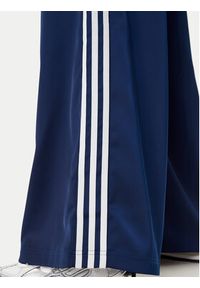 Adidas - adidas Spodnie dresowe adicolor Satin JD0881 Granatowy Wide Leg. Kolor: niebieski. Materiał: syntetyk
