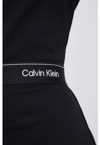 Calvin Klein Sukienka kolor czarny mini rozkloszowana. Kolor: czarny. Materiał: włókno, dzianina. Długość rękawa: krótki rękaw. Wzór: aplikacja. Typ sukienki: rozkloszowane. Długość: mini #2