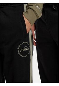 Ellesse Spodnie dresowe Unisex Nioro SHX21064 Czarny Regular Fit. Kolor: czarny. Materiał: bawełna #9