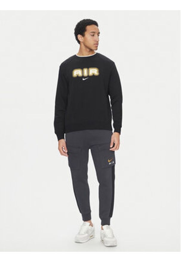 Nike Bluza HM0177 Czarny Regular Fit. Kolor: czarny. Materiał: bawełna