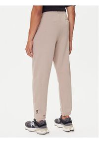 On Spodnie dresowe Club Pants 1ME1004 Beżowy Relaxed Fit. Kolor: beżowy. Materiał: bawełna #3