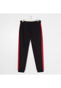 Sinsay - Spodnie dresowe jogger - Czarny. Kolor: czarny. Materiał: dresówka