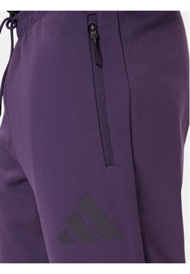 Adidas - adidas Spodnie dresowe Z.N.E. JW4726 Fioletowy Loose Fit. Kolor: fioletowy. Materiał: syntetyk, bawełna