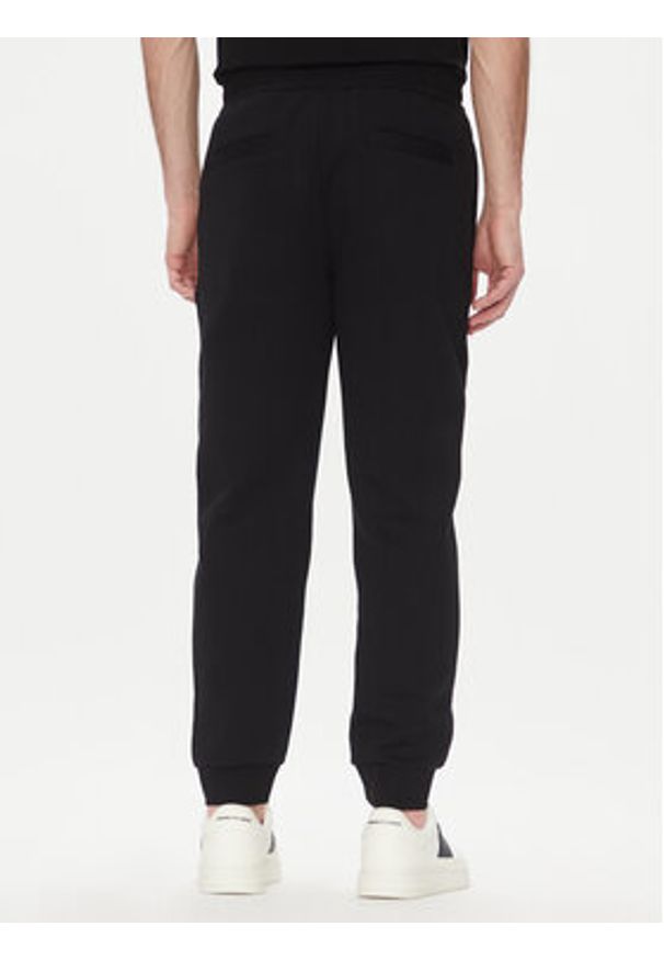 Armani Exchange Spodnie dresowe XM000744 AF13047 UC001 Czarny Regular Fit. Kolor: czarny. Materiał: bawełna