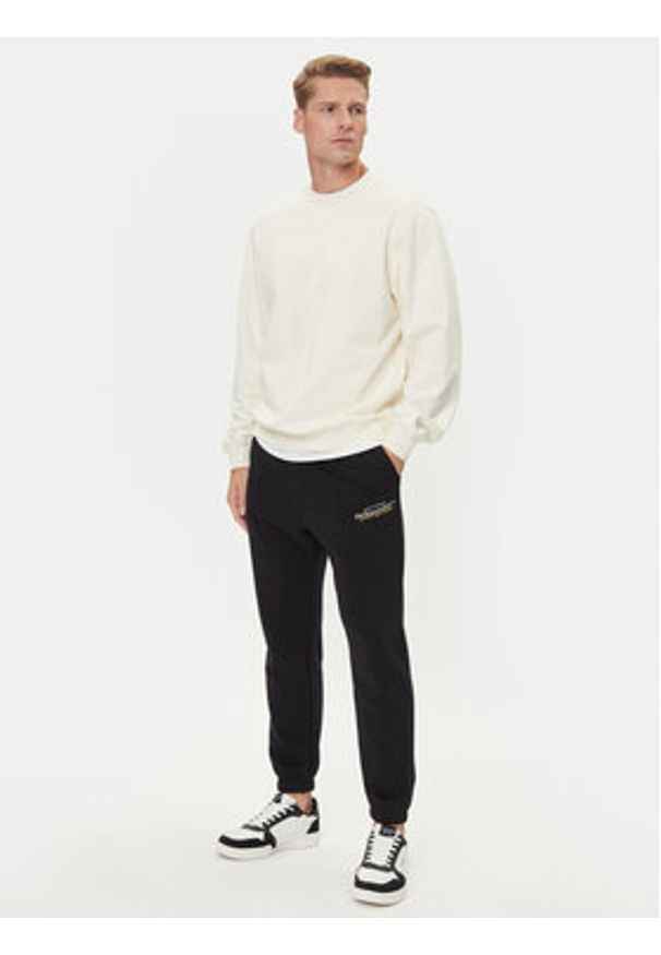 Jack & Jones Spodnie dresowe Kane Billy 12283257 Czarny Relaxed Fit. Kolor: czarny. Materiał: bawełna, syntetyk