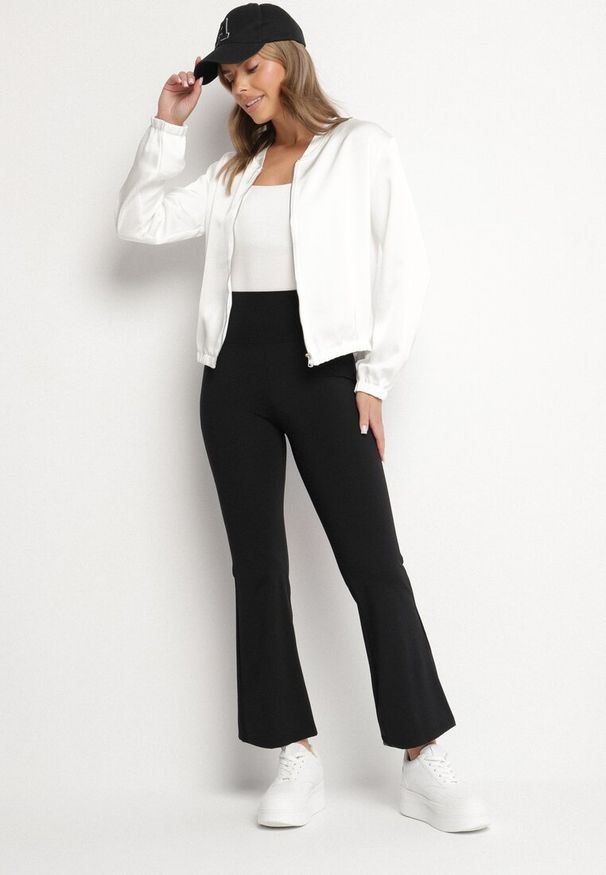 Born2be - Czarne Legginsy o Kroju Dzwonów z Wysokim Stanem Talliara. Okazja: na co dzień. Stan: podwyższony. Kolor: czarny. Styl: elegancki, casual