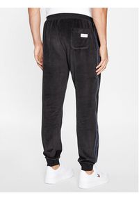 TOMMY HILFIGER - Tommy Hilfiger Spodnie dresowe UM0UM03014 Czarny Regular Fit. Kolor: czarny. Materiał: bawełna, syntetyk #5