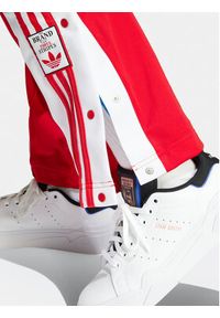 Adidas - adidas Spodnie dresowe Adibreak IP0620 Czerwony Regular Fit. Kolor: czerwony. Materiał: syntetyk #4