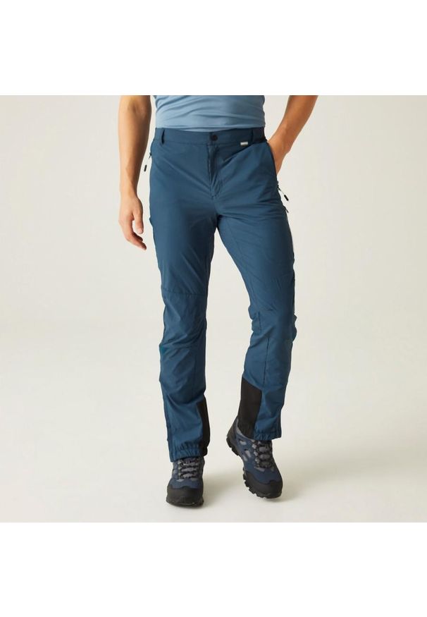 Regatta - Spodnie trekkingowe męskie Mountain III. Kolor: niebieski. Długość: długie. Sezon: lato. Sport: turystyka piesza