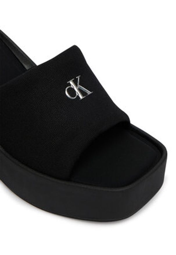 Calvin Klein Klapki Wedge 70 Sndl Canv Mg HW0HW03134 Czarny. Kolor: czarny. Materiał: materiał