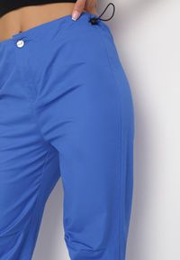 Born2be - Niebieskie Szerokie Spodnie ze Stoperami Dalfo. Kolor: niebieski #5