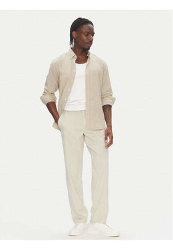 Lindbergh Koszula 30-203344B Beżowy Relaxed Fit. Kolor: beżowy. Materiał: bawełna