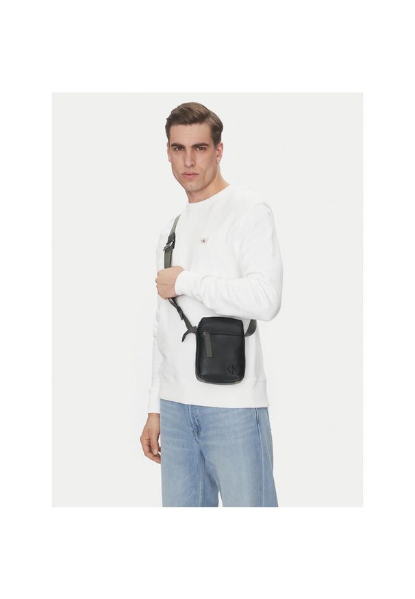 Saszetka Calvin Klein Jeans. Kolor: czarny