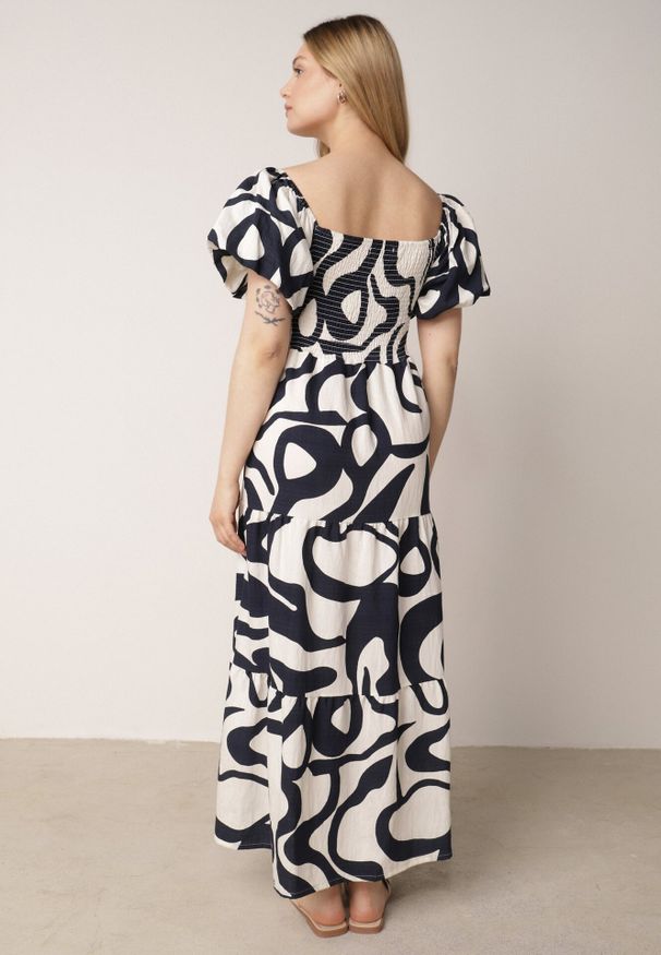 Born2be - Granatowa Wiskozowa Sukienka z Bufiastymi Rękawami w Abstrakcyjny Wzór Tibee. Okazja: na co dzień. Kolor: niebieski. Materiał: wiskoza. Wzór: nadruk. Typ sukienki: proste. Styl: elegancki, wakacyjny, casual