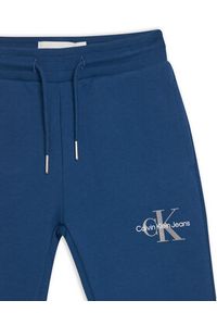 Calvin Klein Jeans Spodnie dresowe Monogram Logo IU0IU00285 M Niebieski Regular Fit. Kolor: niebieski. Materiał: bawełna