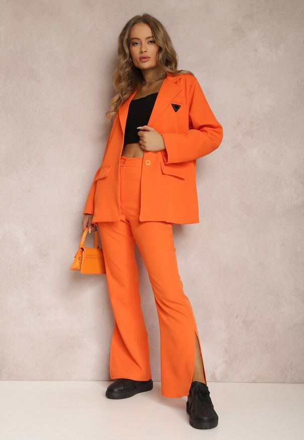 Renee - Pomarańczowe Spodnie Dzwony Evissa. Kolor: pomarańczowy. Materiał: koronka. Długość: krótkie. Wzór: jednolity. Styl: elegancki