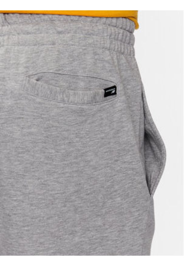 New Balance Spodnie dresowe MP31902 Szary Regular Fit. Kolor: szary. Materiał: bawełna, syntetyk
