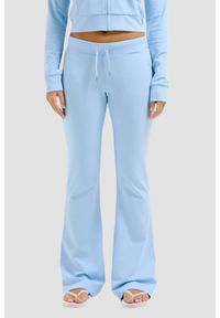 Juicy Couture - JUICY COUTURE Błękitne damskie spodnie dresowe Single Jersey Apollo Low Rise, Rozmiar S. Kolor: niebieski. Materiał: dresówka, jersey