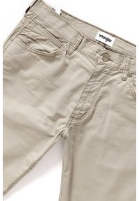 Wrangler - WRANGLER SPODNIE MĘSKIE GREENSBORO CAMEL WASHED W15QMM49J. Materiał: materiał