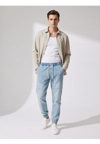 Sinsay - Spodnie jogger - niebieski. Kolor: niebieski