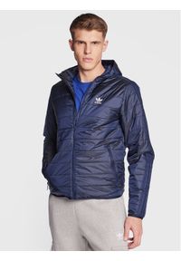 Adidas - adidas Kurtka przejściowa Padded Hooded Puffer Jacket HL9210 Niebieski Regular Fit. Kolor: niebieski. Materiał: syntetyk #1