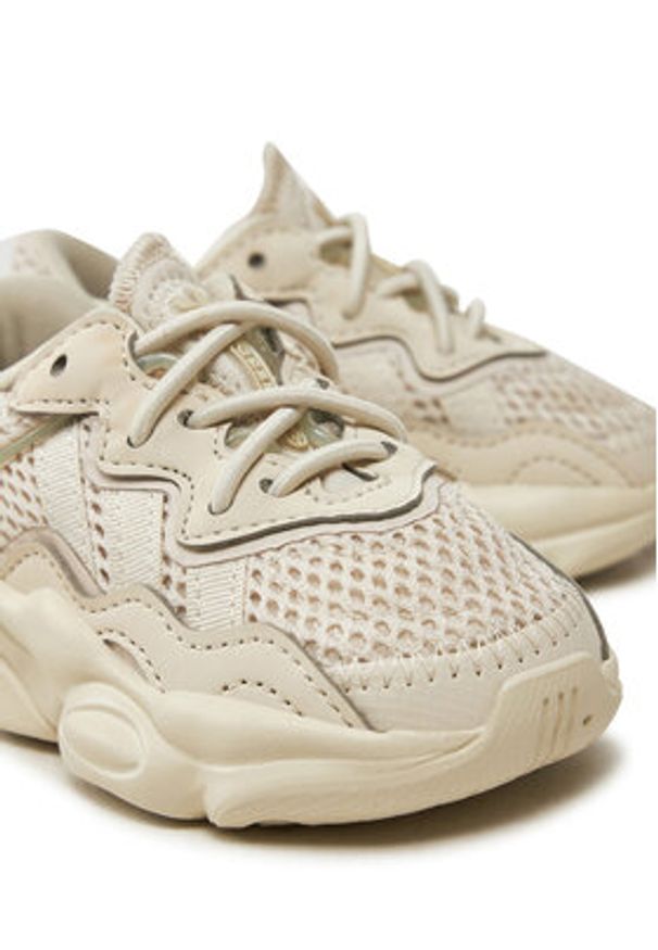 Adidas - adidas Sneakersy OZWEEGO IG9026 Beżowy. Kolor: beżowy. Materiał: materiał