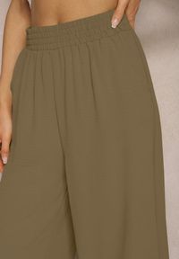 Renee - Ciemnozielone Spodnie Palazzo z Gumką w Talii i Długością Nogawki 3/4 Moolia. Kolekcja: plus size. Kolor: zielony. Materiał: materiał #4