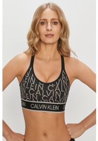 Calvin Klein Performance - Biustonosz sportowy. Kolor: czarny. Materiał: poliester, materiał, elastan #1