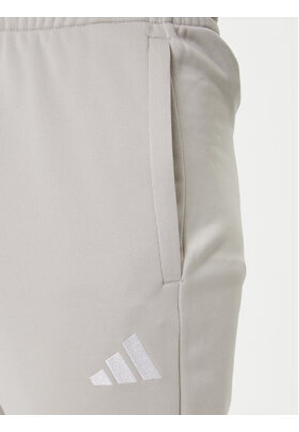 Adidas - adidas Dres Basic 3-Stripes JX5519 Beżowy Regular Fit. Kolor: beżowy. Materiał: syntetyk